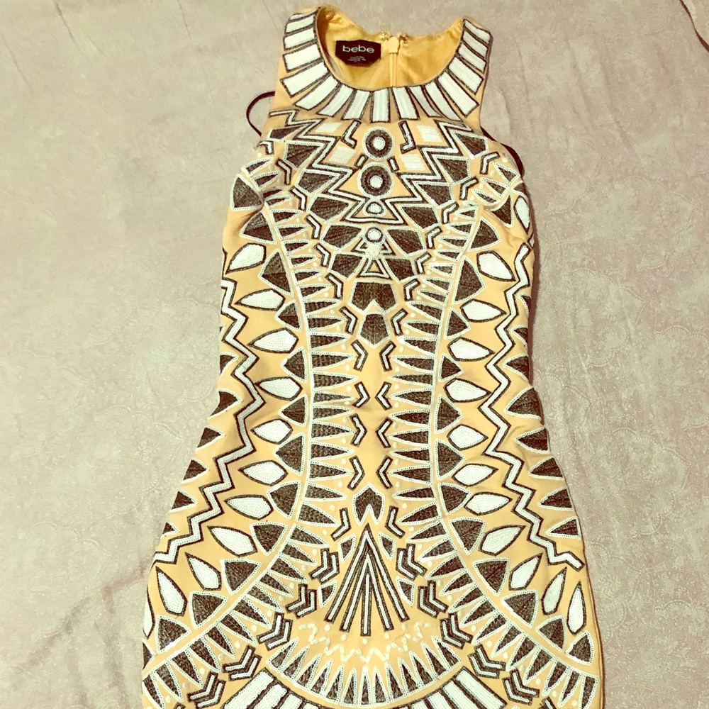 Beautiful bebe midi dress in multiple colors.